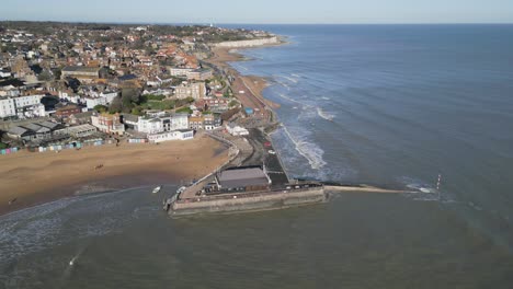 a panning drone shot of broadstairs harbour in kent