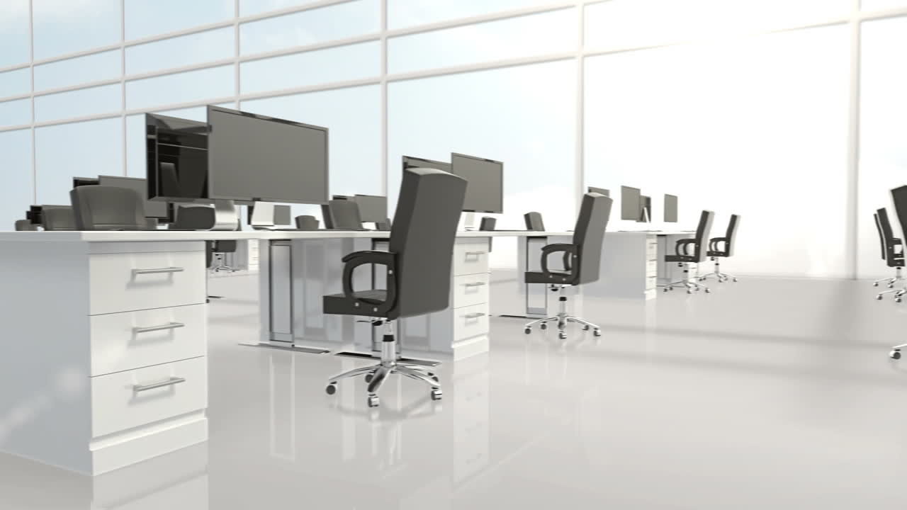 Empty office with desks and computers