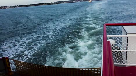 a view from the stern of casco bay ferry showing wake