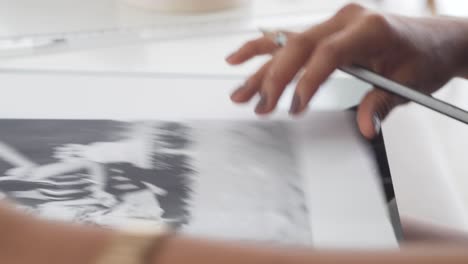 Hands-of-young-Latina-girl-working-with-pencil-and-ruler-on-creative-project