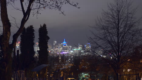vancouver lookout at downtown city viewed from commercial drive at night - time lapse, wide shot