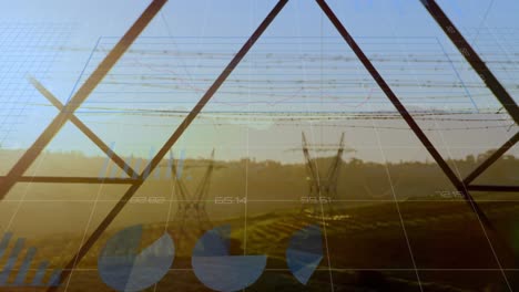 Animation-of-financial-graphs-and-data-over-electricity-poles-at-sunset