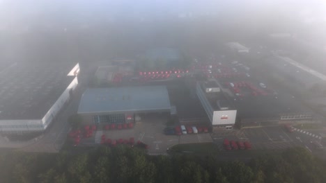 aerial view of basingstoke hampshire royal mail distribution center during foggy august morning