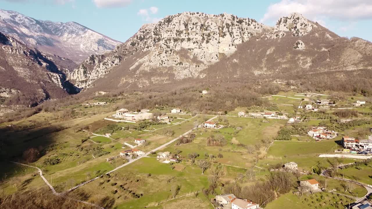 Aerial landscape view over italian mountain villages, on a sunny day