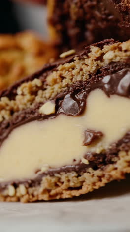 close-up of a decadent layered chocolate dessert bar
