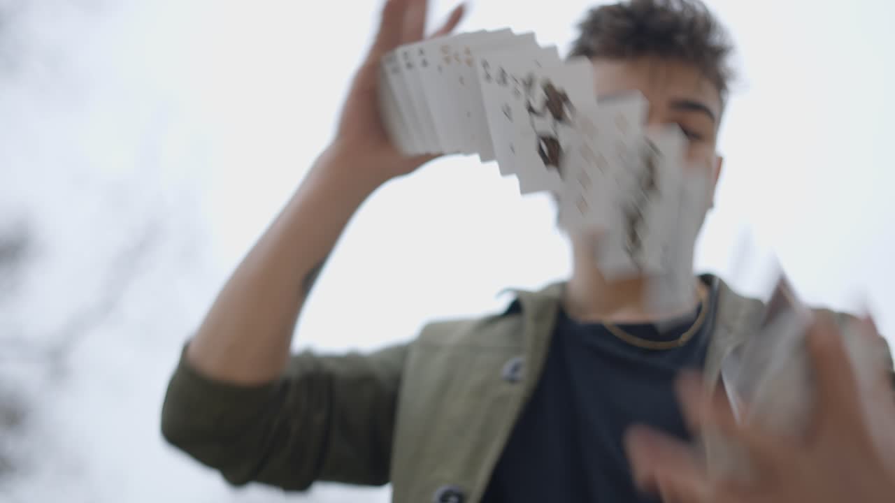 Man Performing Magic Card Trick