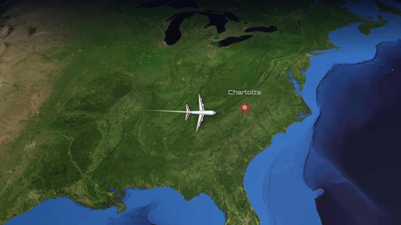 Satellite view animation follows a commercial airplane flying from Phoenix, Arizona to Charlotte, North Carolina