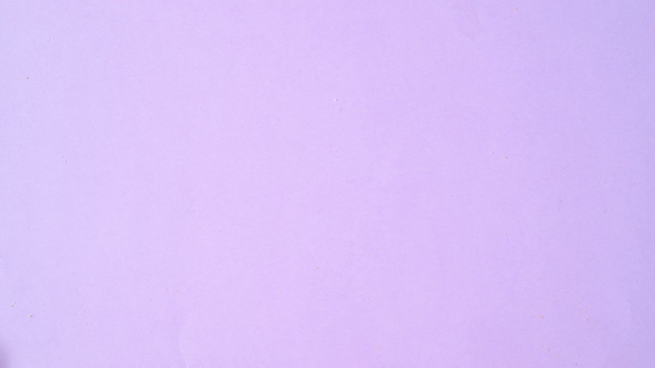 Round biscuit cookies make pattern on light purple theme. Stop motion flat lay