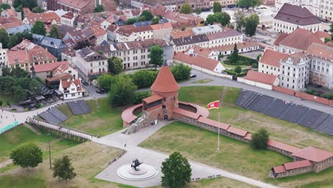 kaunas castle and red rooftops of old town buildings, aerial view