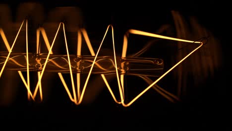 close-up of a vintage edison style light bulb filament
