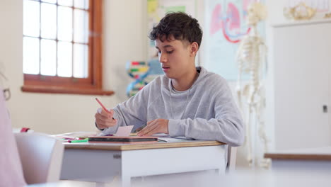 school, exam and a boy student writing in class