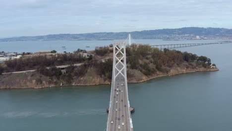 aerial: drivers crossing the bridge, drove view