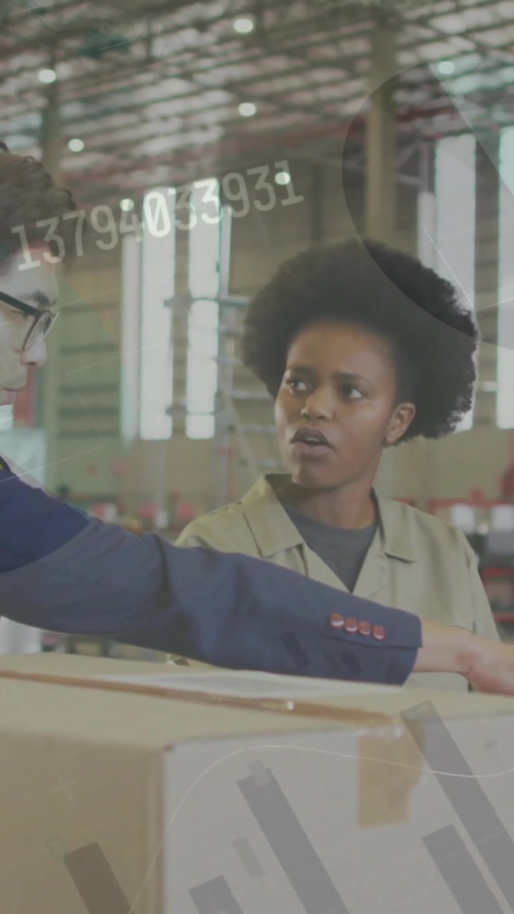 Man and Woman Discussing Logistics in Warehouse with Digital Data Overlay