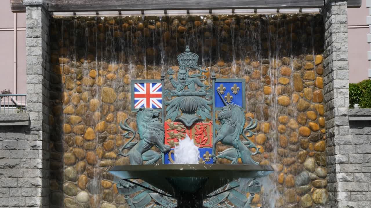 Confederation Fountain in Victoria, Canada, British Columbia.Canada’s coat of arms in the background.