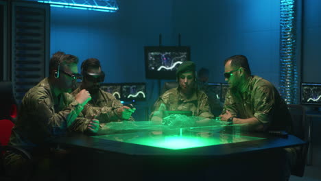 Military Personnel in Command Center Using VR/AR