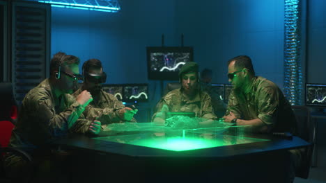 military personnel in command center using vr/ar