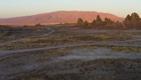 beautiful trona pinnacles durung red sunset. drone