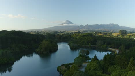 aerial flight over lake mangamahoe view mount taranaki-egmont in background