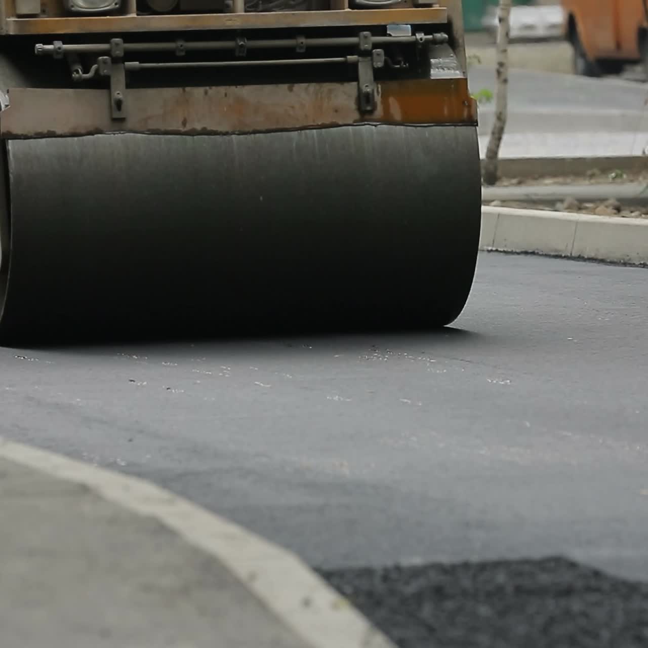Laying Asphalt With Road Construction