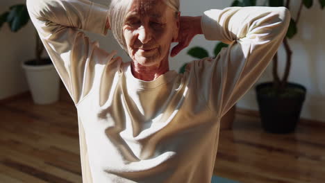 Senior Woman Practicing Yoga at Home