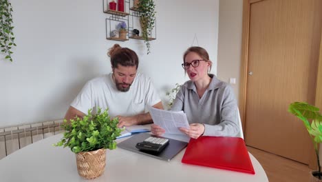 couple reviewing finances at home