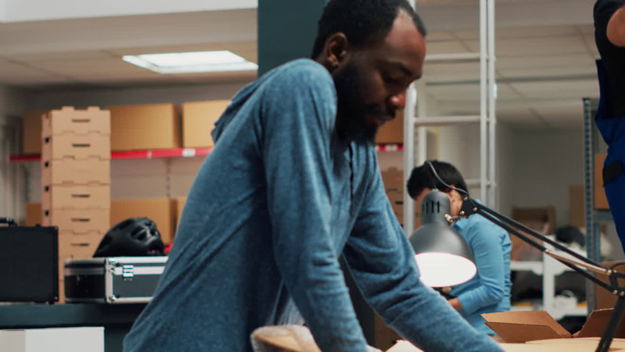 Man packing items in a warehouse