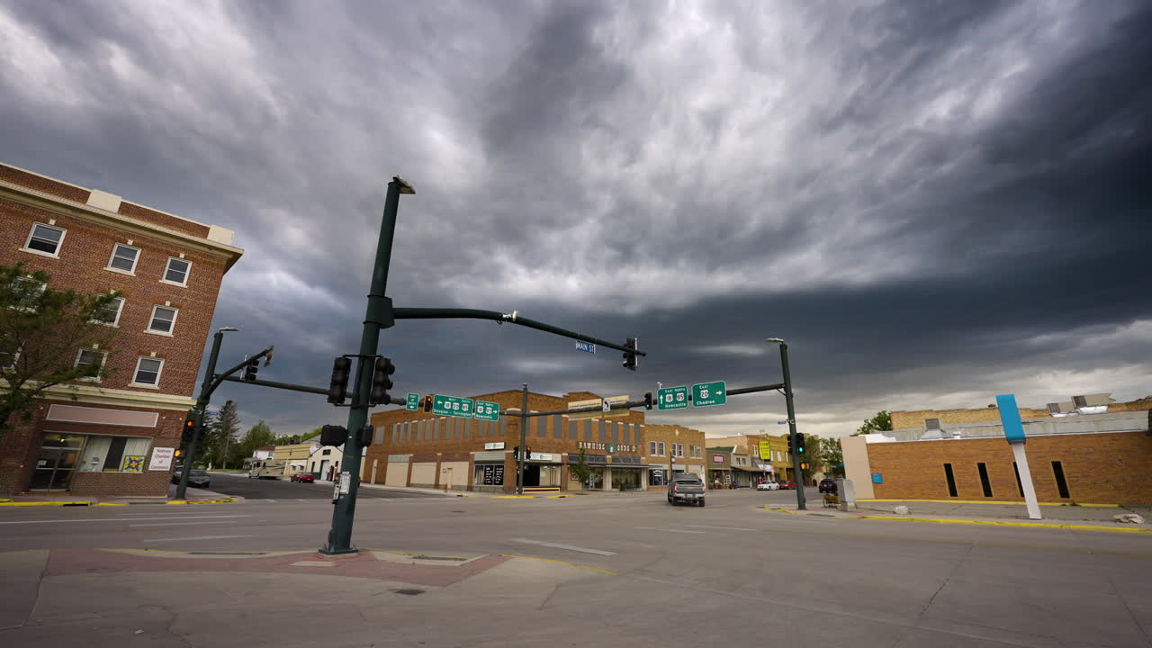 Small Midwest America town with dark storm clouds