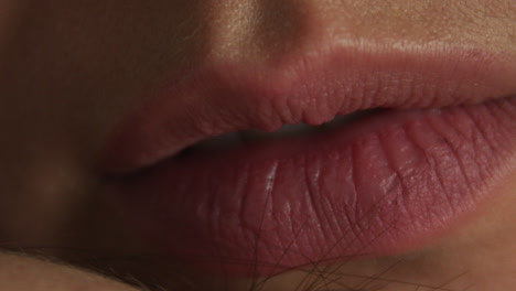 Close-up-of-young-Caucasian-female's-lips