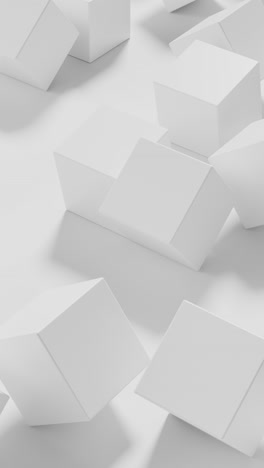 white cubes roll on a white background. vertical looped animation