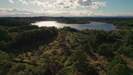 Aerial-panoramic-lake-landscape-around-japanese-green-forest-in-Wakayama-Japan-green-and-blue-environment-clean-travel-destination,-Asian-summer