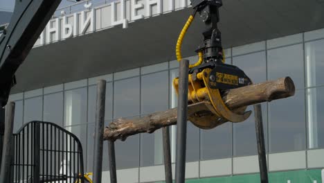 log loading machinery at an exhibition