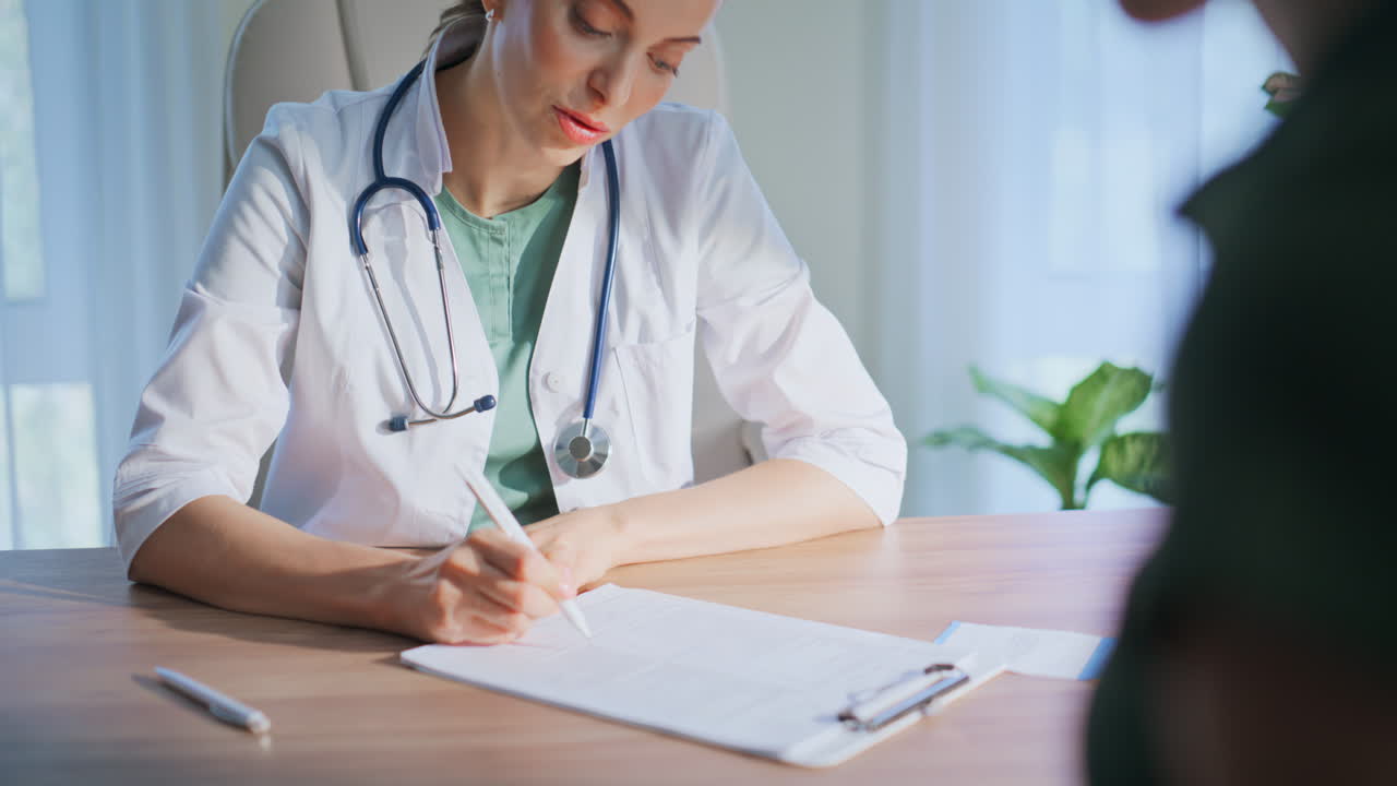Medical worker discussing symptoms with patient closeup. Doctor explain therapy