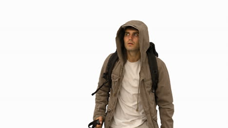 attractive man with a coat trekking on white screen