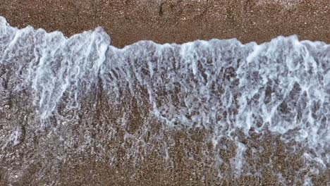 waves crashing on the beach