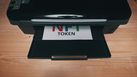 nft token printing, inscription on white sheet of paper printed by a jet printer