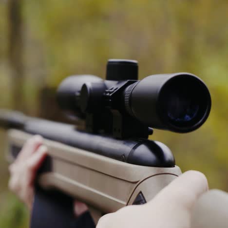 hunter aiming for wildlife