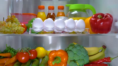 open refrigerator filled with food