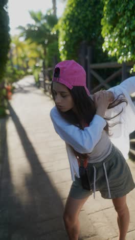 young woman posing outdoors