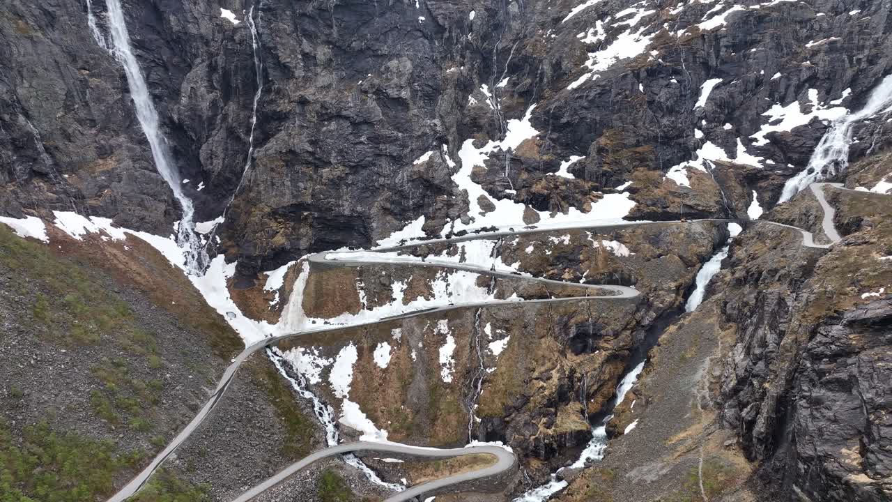 Trollstigen Trolls road winding up vertical hillside in Rauma Norway - Spectacular and unique road
