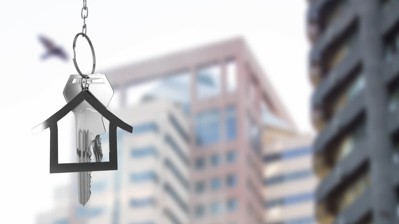 animación de las llaves de la casa de plata colgadas contra la vista borrosa de los edificios altos