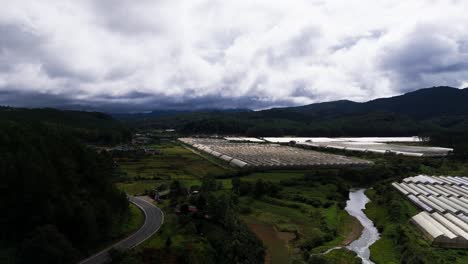aerial view pan of the river and the road in lam dong