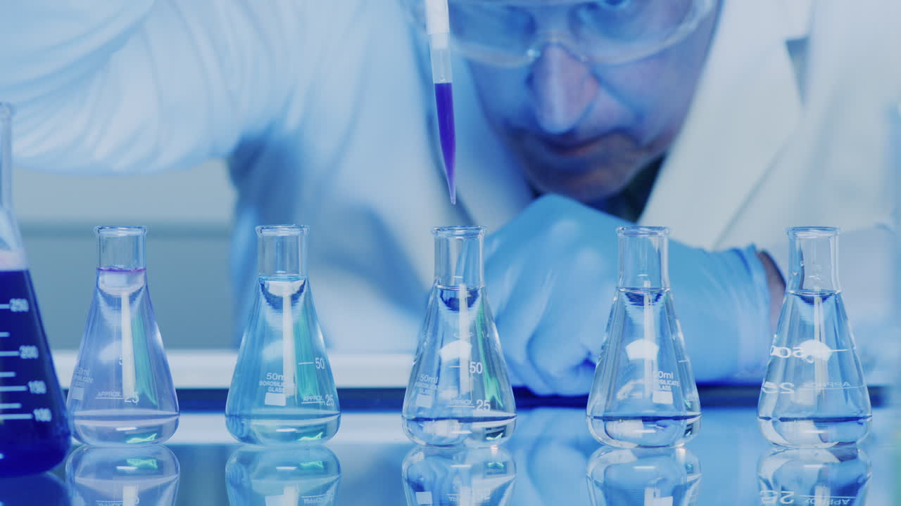 Closeup of laboratory scientist testing