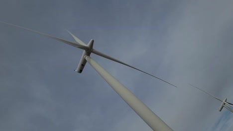 massive wind turbine spinning blades