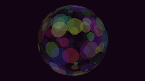 colorful circle ball floats in air against black background