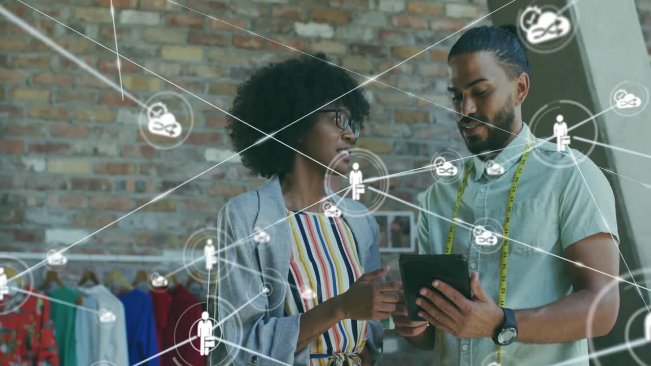 Animation of network of connections with icons over diverse business people in office