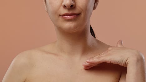 close-up of a woman's upper body with bare shoulders