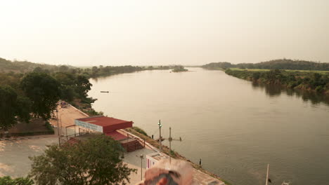 traveling-front,-Muxima,-place-of-religious-worship,-Angola,-Africa,-the-Kwanza-river-in-the-background-3