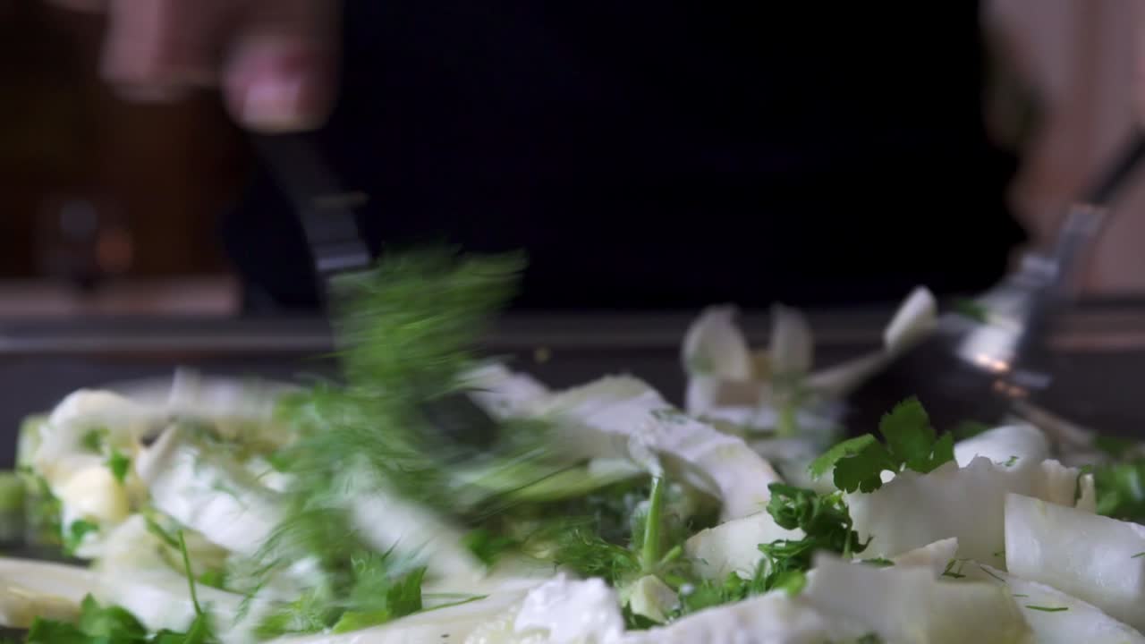 Chef Mixing Fennel With Fresh Green Herbs, Dressing And Seasoning