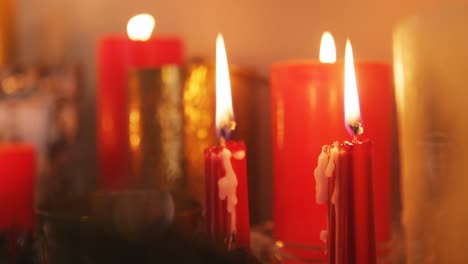 Close-up-of-candles-burning