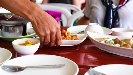 sharing a meal of fried squid together